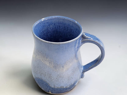 Tall 500ml ceramic mug with softly shaped body and blue speckled finish