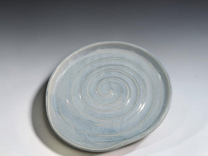 Soft blue grey ceramic spoon rest measuring approximately 15cm across