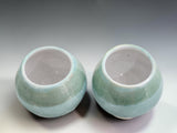Japanese-inspired stoneware tea cups handmade in Melbourne, featuring layered green glazes that create unique organic variations.