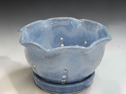Ceramic berry bowl with matching drip plate in glossy blue glaze