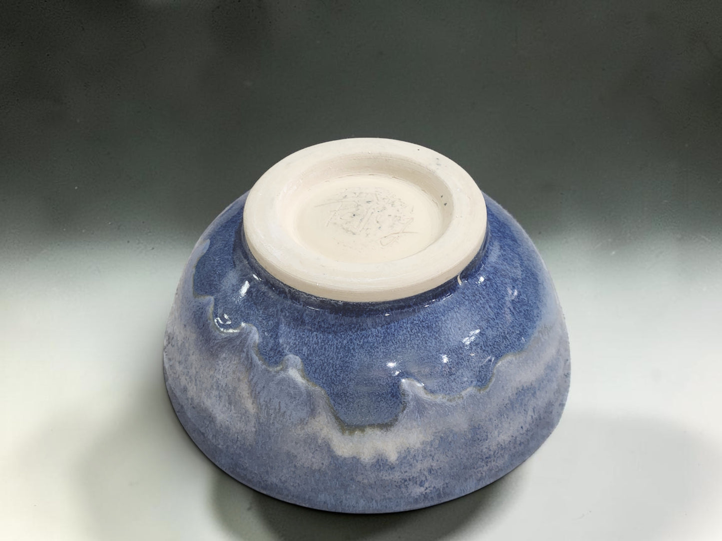 Wheel-thrown ceramic cereal bowls with soft cloud blue glaze