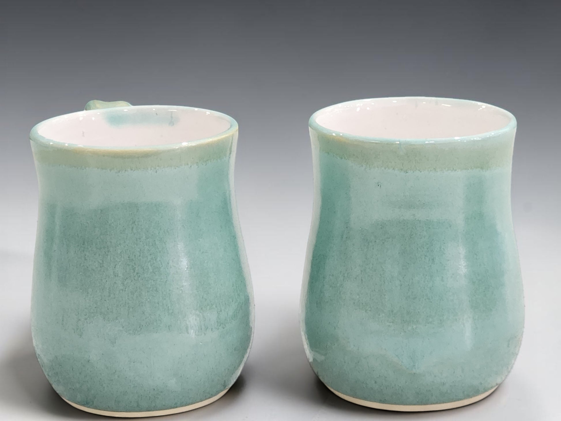 Stoneware mug handmade by Buxton Pottery, featuring subtle glaze movement and unique handcrafted character in every piece.