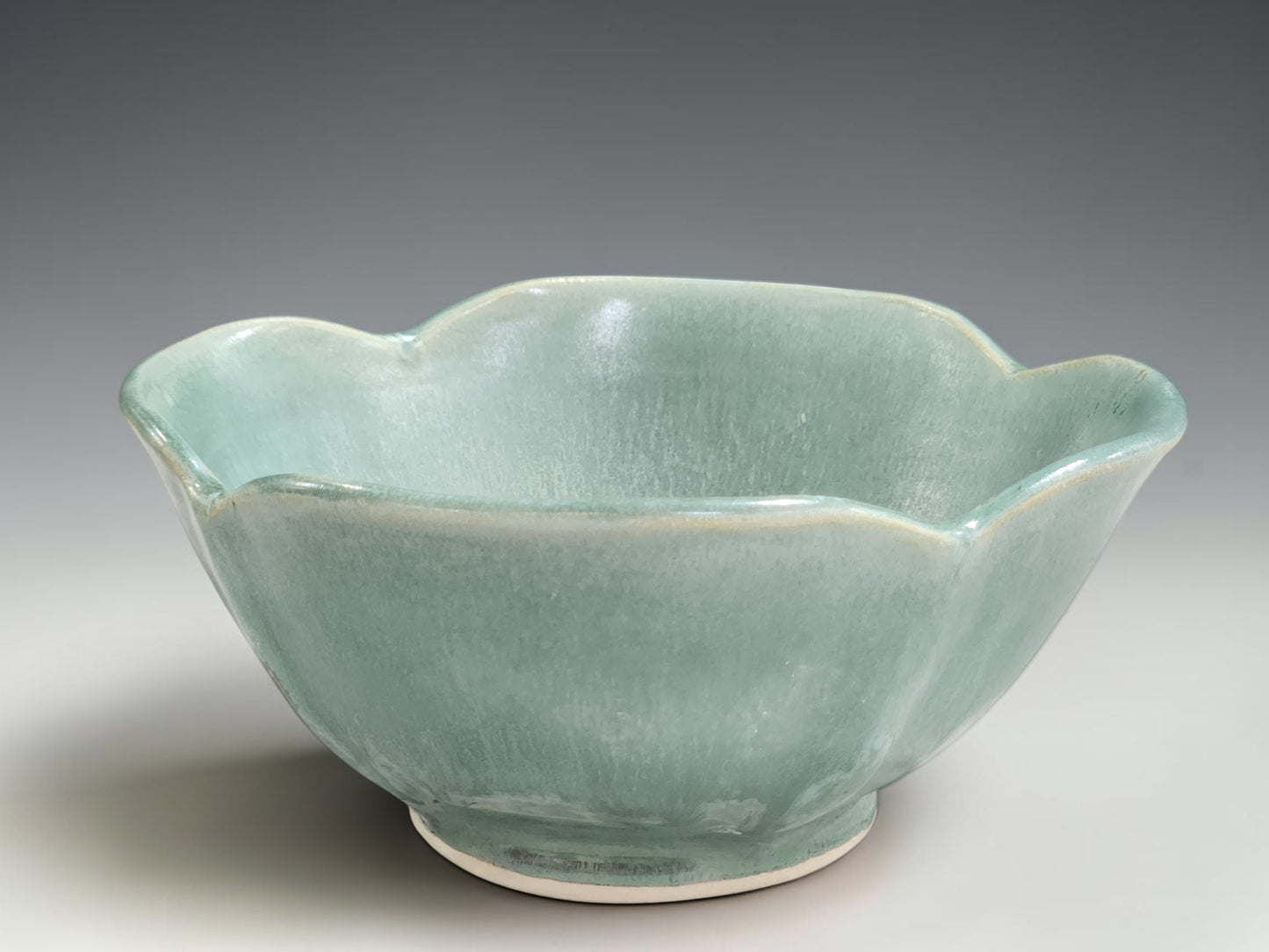 Australian handmade ceramic bowl with seafoam green glaze and sculptural handmade shape