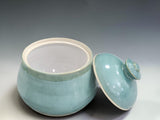 Australian handmade pottery sugar bowl in soft green glaze, crafted for modern kitchens and lovers of artisan ceramics.