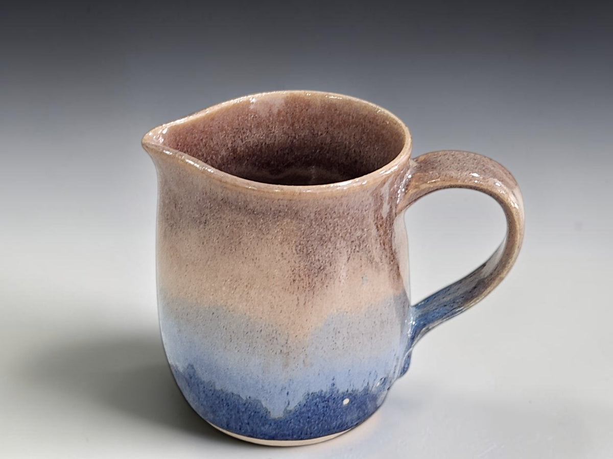 Handmade 300 ml milk jug with curved handle and pouring lip