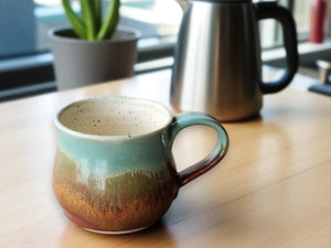 Handmade pottery mug 350ml with rustic green glaze