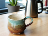 Handmade pottery mug 350ml with rustic green glaze