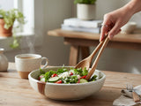 Handmade pottery pasta bowl in speckled cream with brown slash