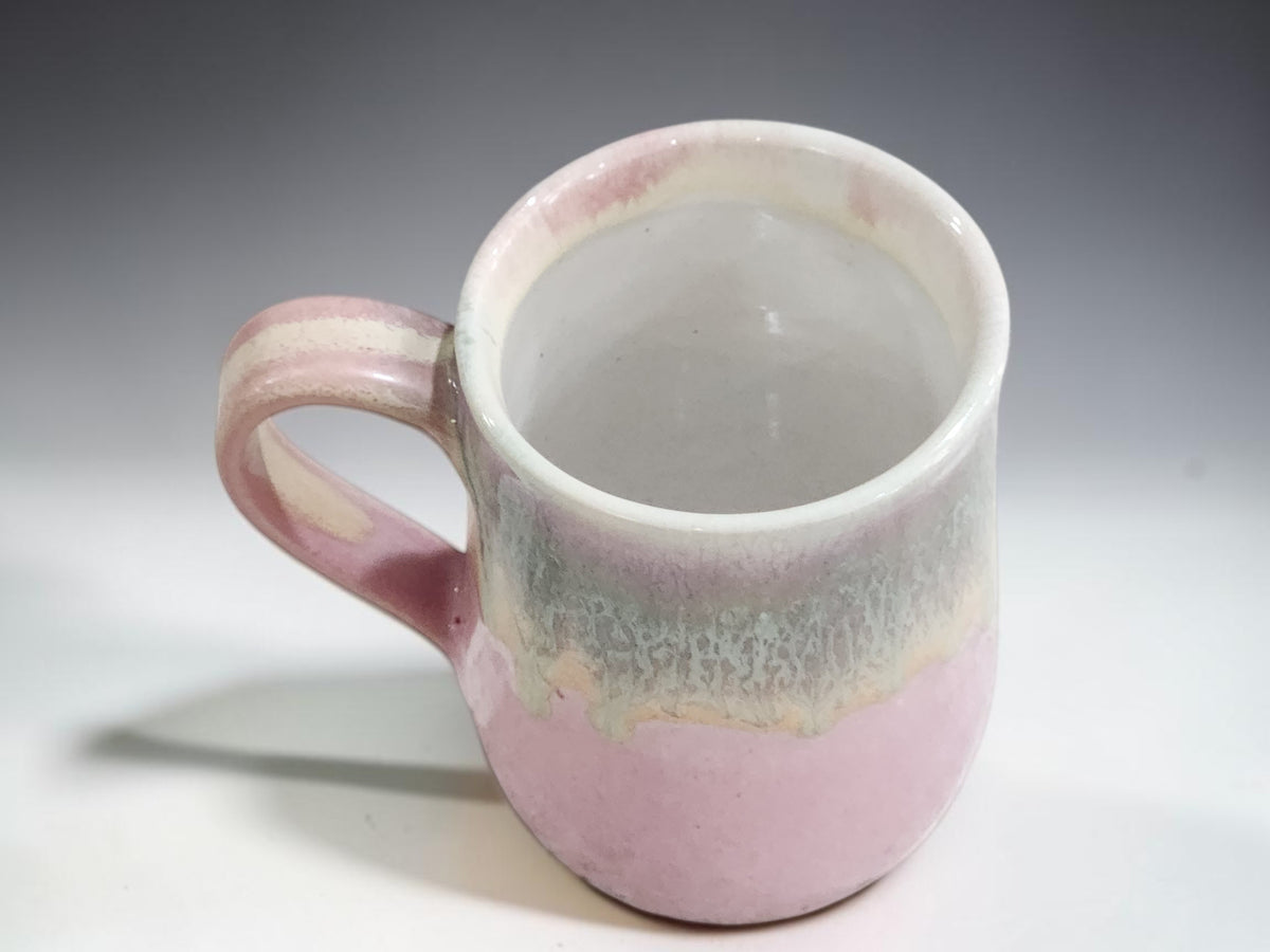 Pink handmade stoneware mug with layered glaze detail by Buxton Pottery Melbourne