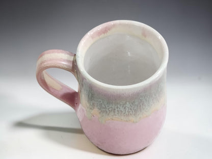 Pink handmade stoneware mug with layered glaze detail by Buxton Pottery Melbourne