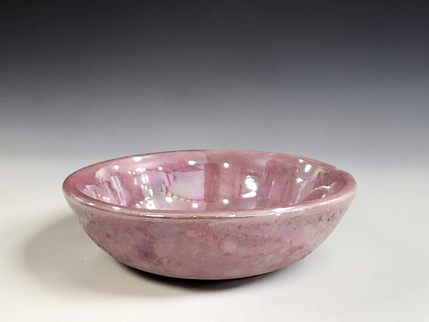 Handmade jewellery dish in pink pottery glaze