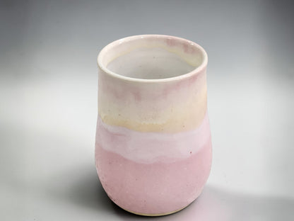 Wheel thrown ceramic mug with pink and creamy white glaze, handmade in Melbourne