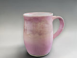 Handmade pottery mug in pink for coffee or tea