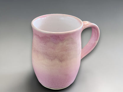 Unique ceramic mug in soft pink glaze