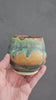 Handmade yunomi in moss green & amber glazes. Crafted in Melbourne, Australia. A unique ceramic cup for tea, coffee, or whisky lovers.