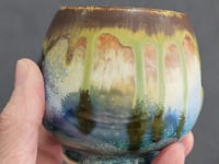 Handmade yunomi in moss green & amber glazes. Crafted in Melbourne, Australia. A unique ceramic cup for tea, coffee, or whisky lovers.