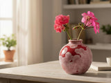 Handmade ceramic crystalline bud vase in a red and white glaze finish.