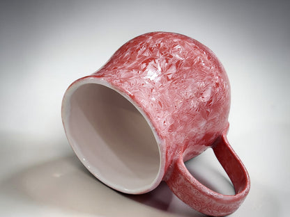 Australian studio pottery mug with red and pale crystal glaze