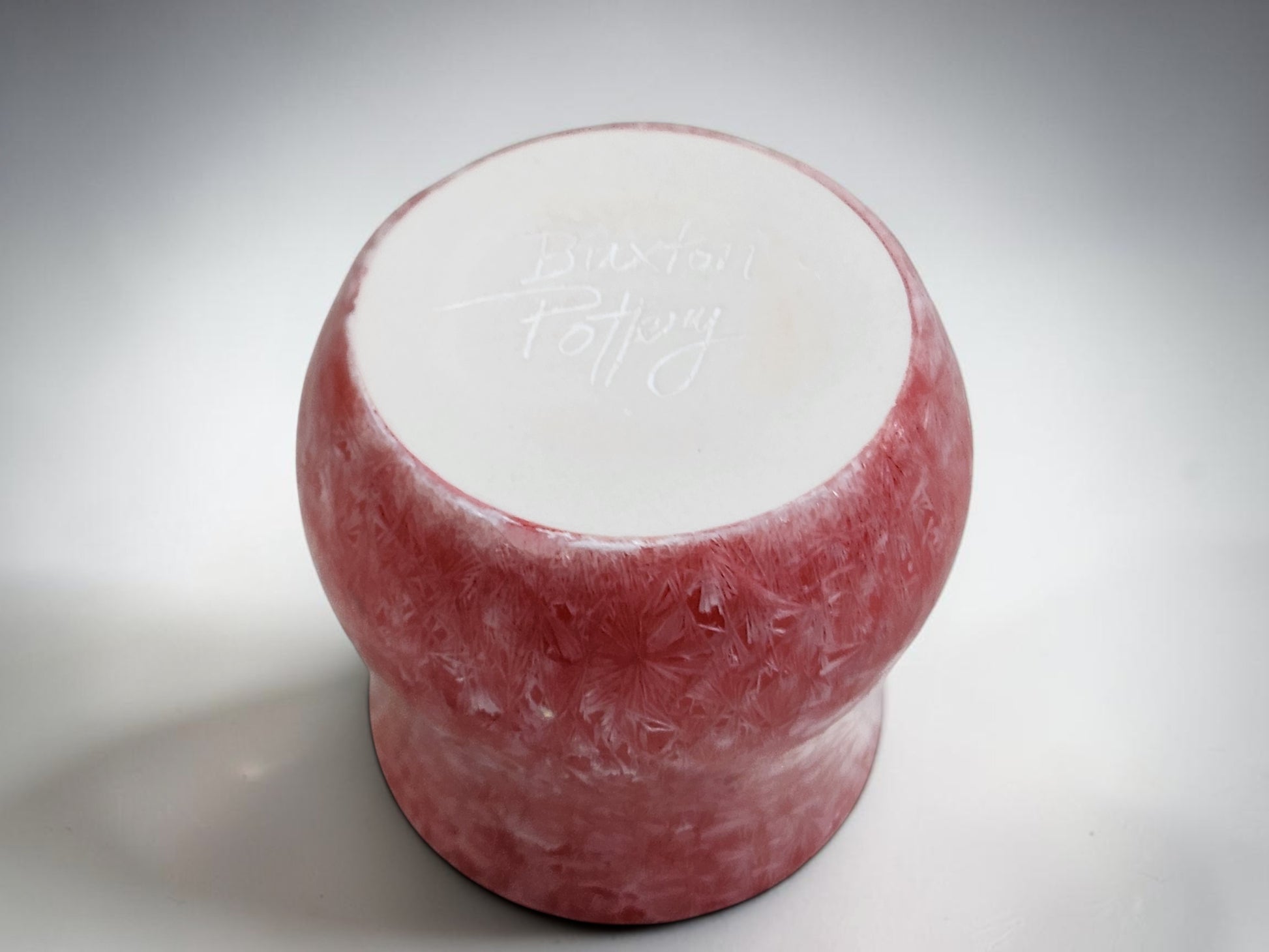 Underside of a Unique red crystalline mug gift for a coffee or tea lover