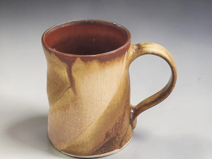 Australian handmade stoneware coffee mug with warm oatmeal and brown glaze