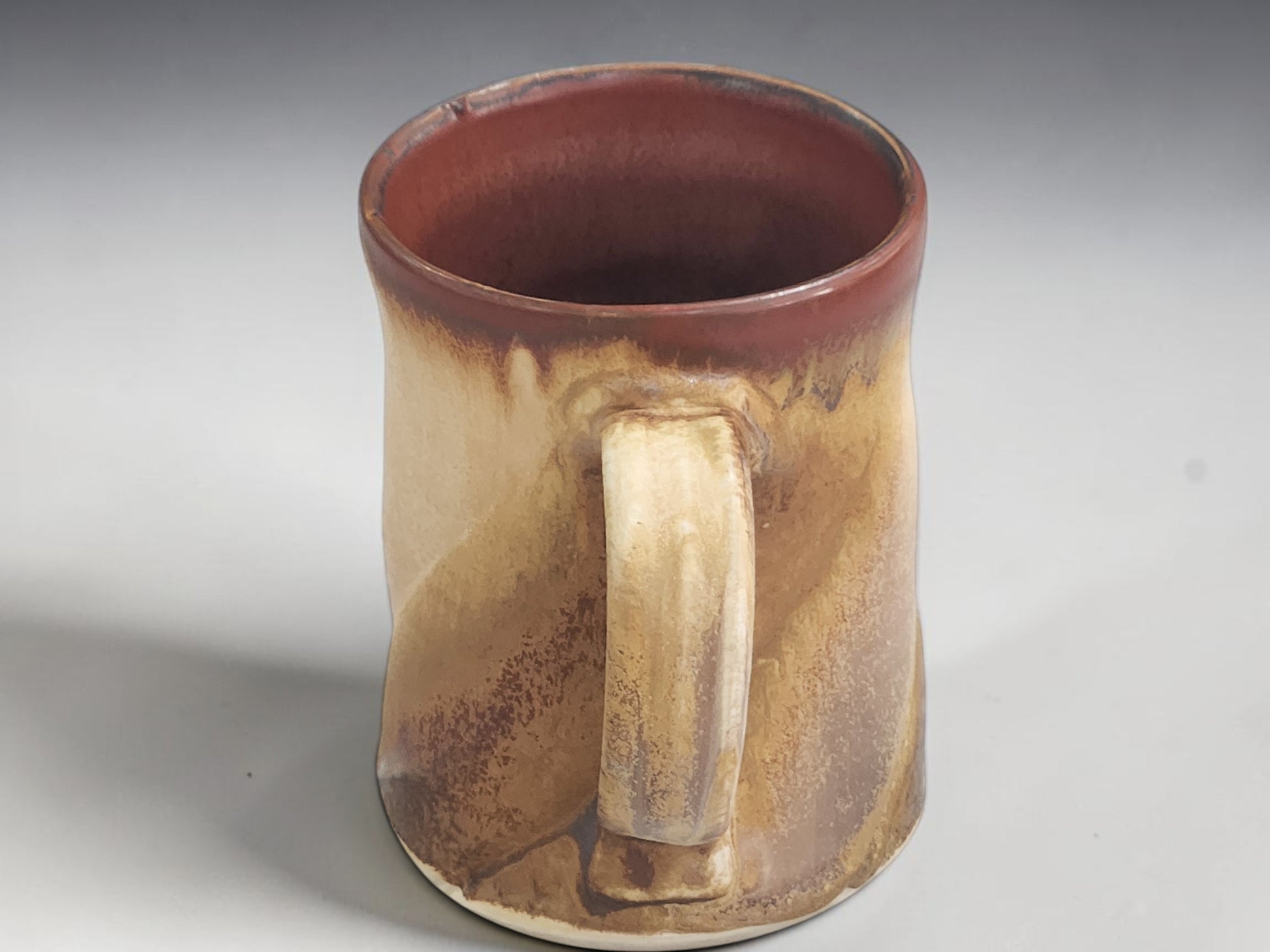 Bush Creek Earth Collection handmade pottery mug by Buxton Pottery showing handle.