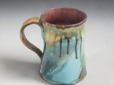 Artisan ceramic mug handmade in Melbourne featuring earthy Australian landscape-inspired glazes.