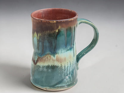 Handmade Australian stoneware mug with comfortable curved handle and unique glaze.