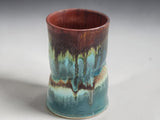 Artisan pottery mug from the Bush Creek Earth Collection with one-of-a-kind glaze patterns.