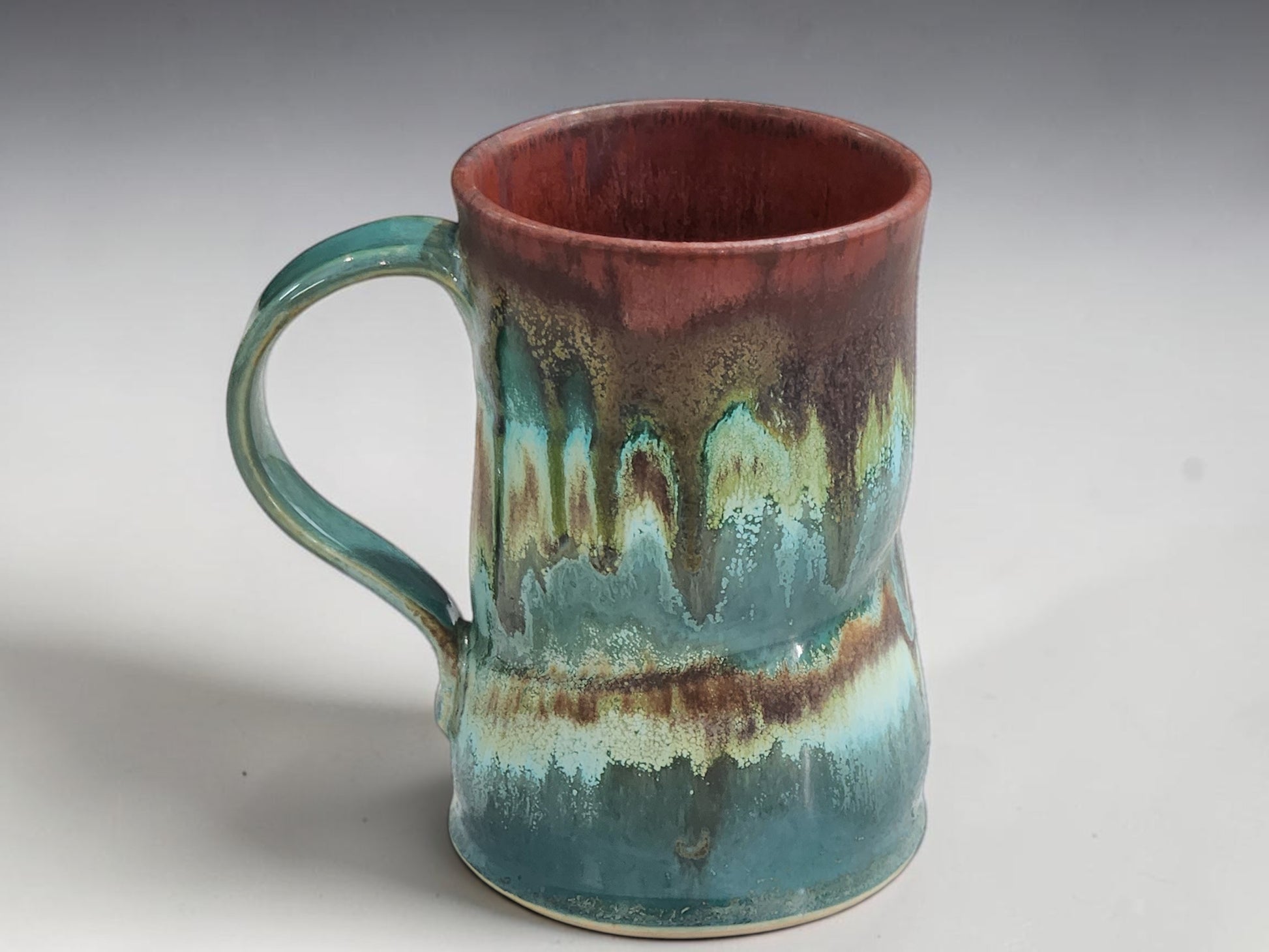 Rustic handmade ceramic mug suitable for coffee, tea or hot chocolate.