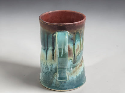 Australian handmade pottery mug with organic landscape-inspired glazes and comfortable handle.