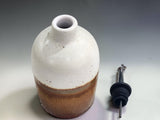 Wheel-thrown ceramic oil dispenser by Buxton Pottery, featuring a 400ml capacity and elegant handcrafted finish for modern kitchens.