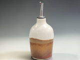 Handmade pottery oil bottle with pouring spout, 400ml capacity, crafted by Buxton Pottery in Melbourne and finished in warm natural stoneware glazes.