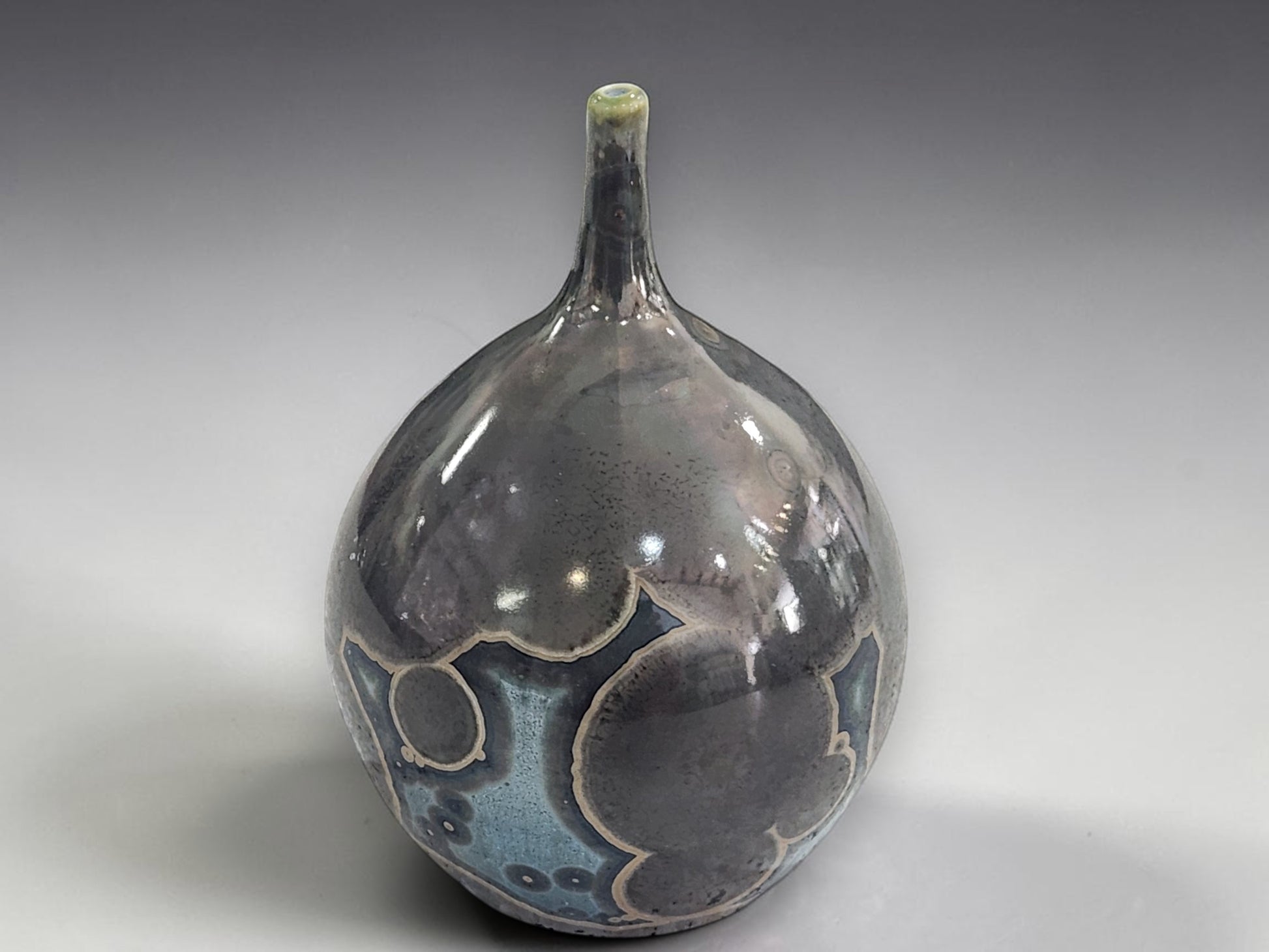 Sculptural handmade pottery bud vase with cosmic glaze
