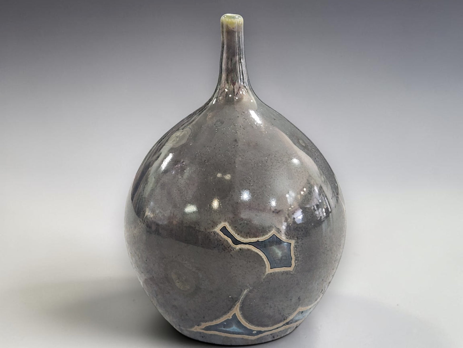 Unique crystal glaze pottery vase with rounded sculptural form