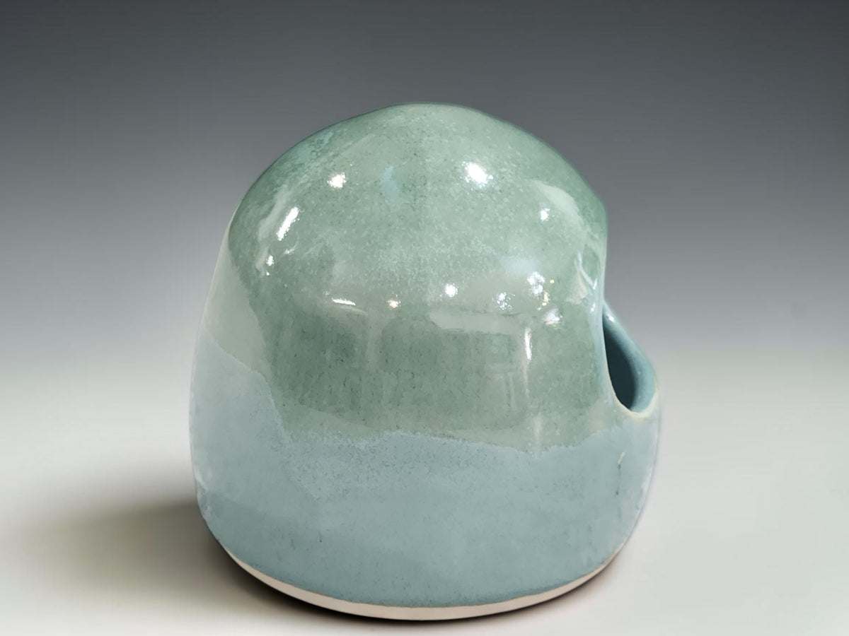 Handmade stoneware salt pig with rounded form and open access for cooking salt