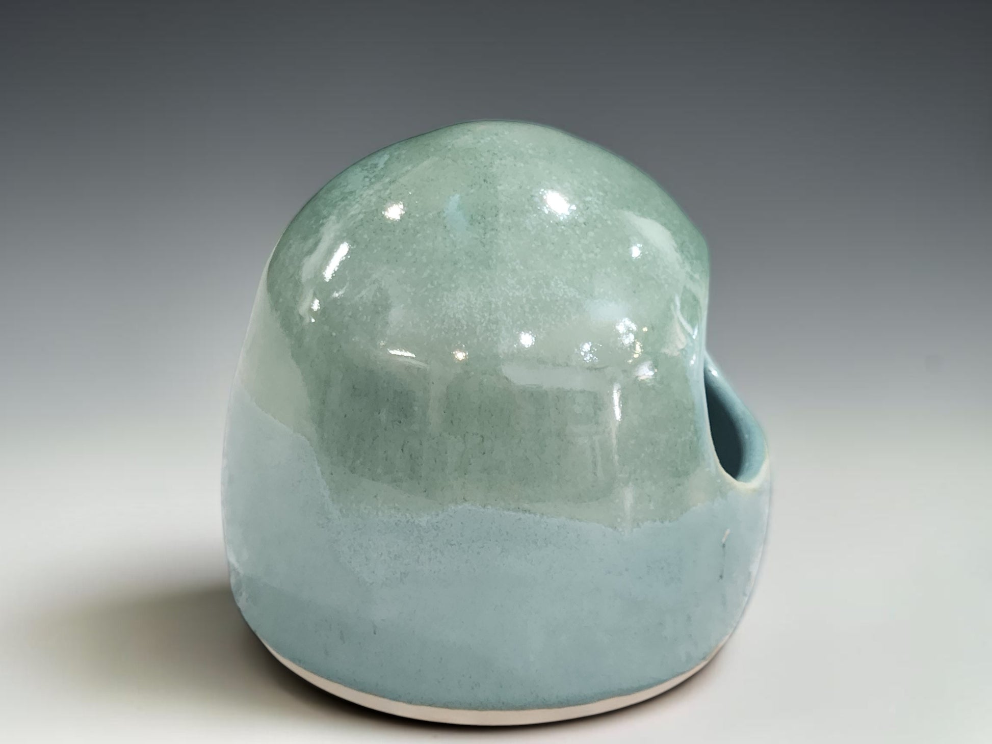 Handmade stoneware salt pig with rounded form and open access for cooking salt
