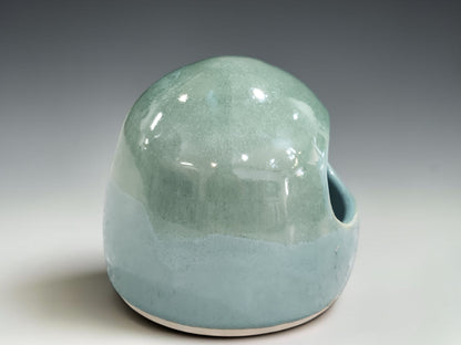 Handmade stoneware salt pig with rounded form and open access for cooking salt