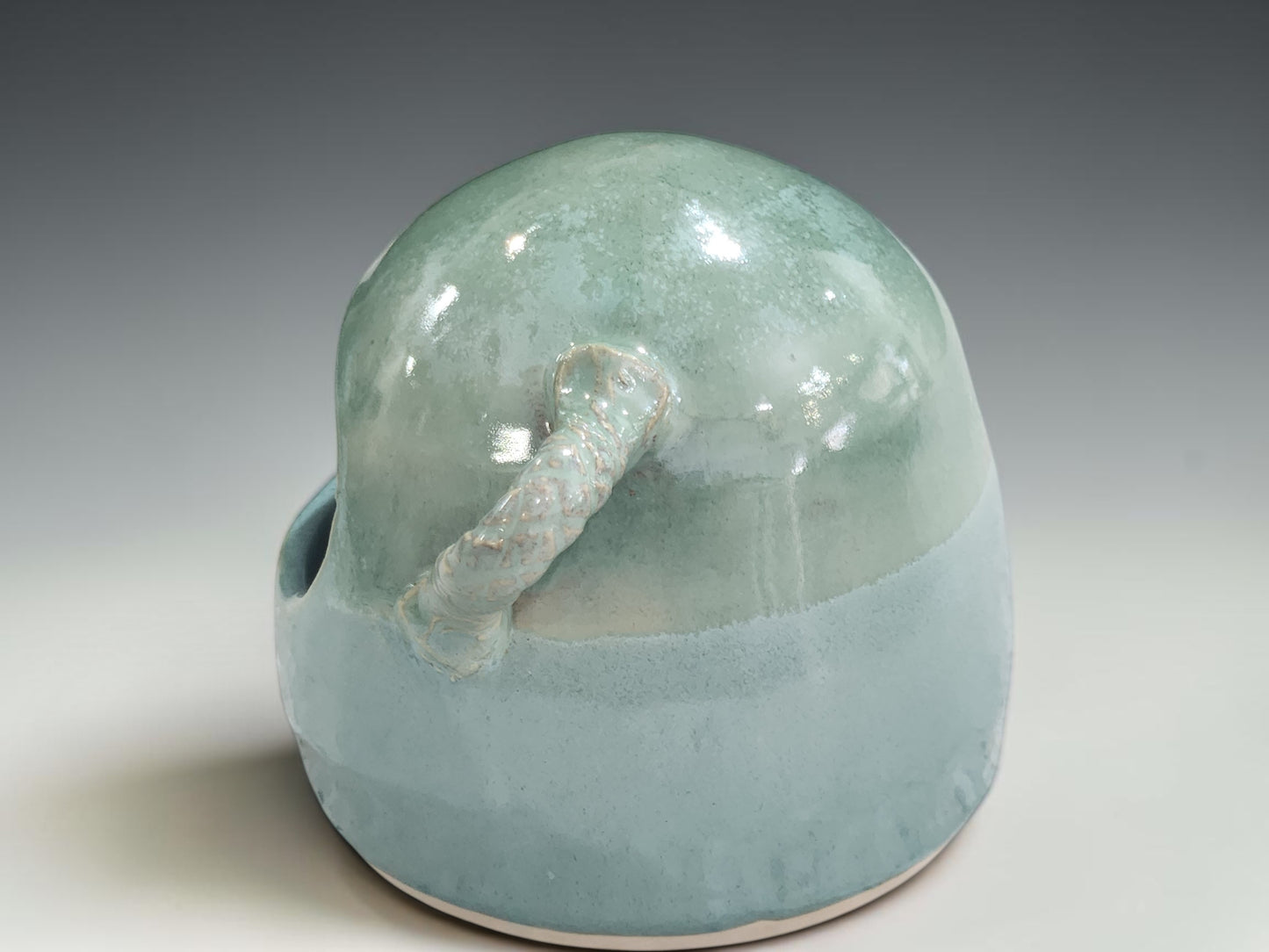 Handmade pottery salt cellar with spoon holder detail for kitchen bench or stovetop use