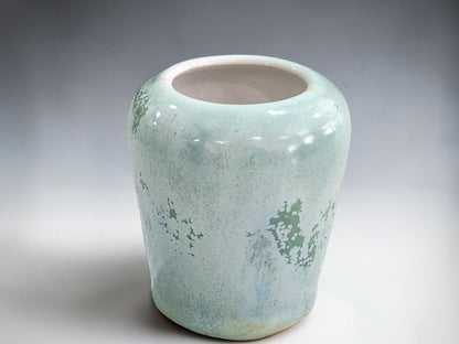 Compact ceramic vase measuring approximately 6 cm at its widest point
