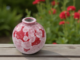 Small ceramic vase with white crystal blooms