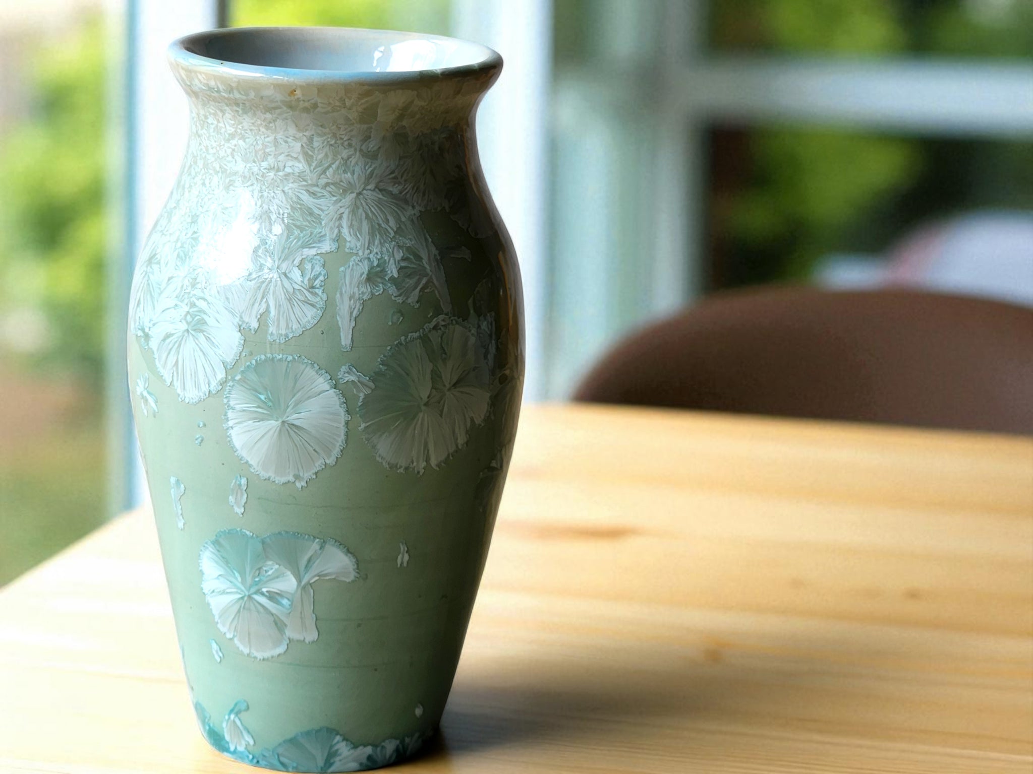 Handmade Australian pottery vase with blue crystalline glaze
