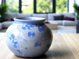 Handmade small crystalline pot in blue-grey glaze with blue crystals