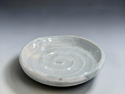 Handmade ceramic kitchen spoon holder in soft blue grey glaze with subtle edge variation