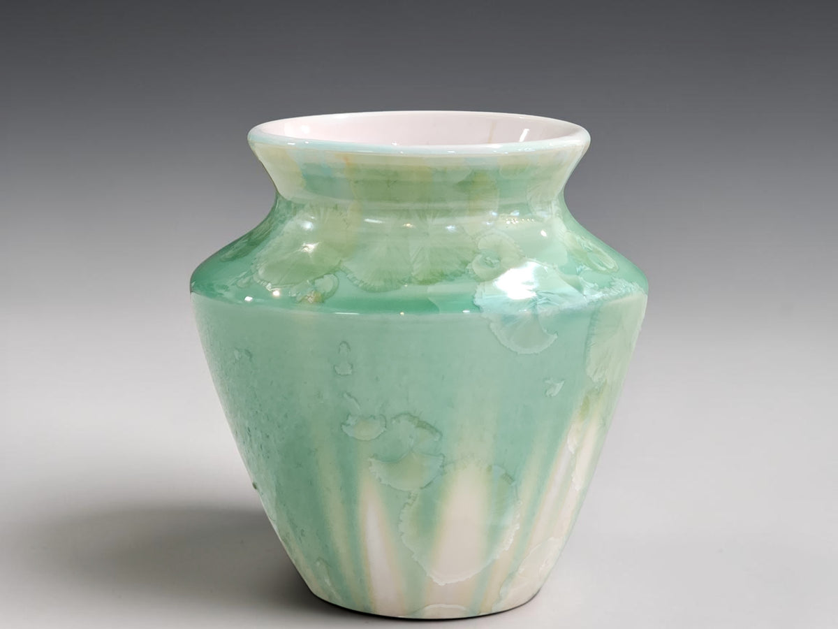 Side profile of artisan ceramic vase with crystal glaze finish
