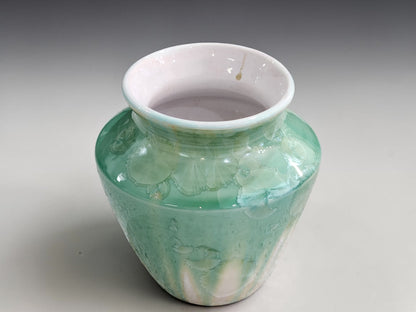 Handmade pottery vase with mint green crystalline patterns