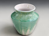 Artisan bud vase with delicate flower-like crystal formations