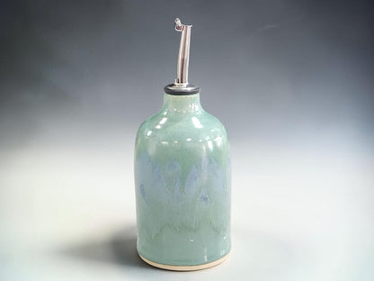 Handmade ceramic oil bottle with soft green and blue glaze, 350 ml