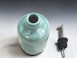 Modern handmade ceramic vinegar and olive oil bottle crafted in Melbourne, Australia