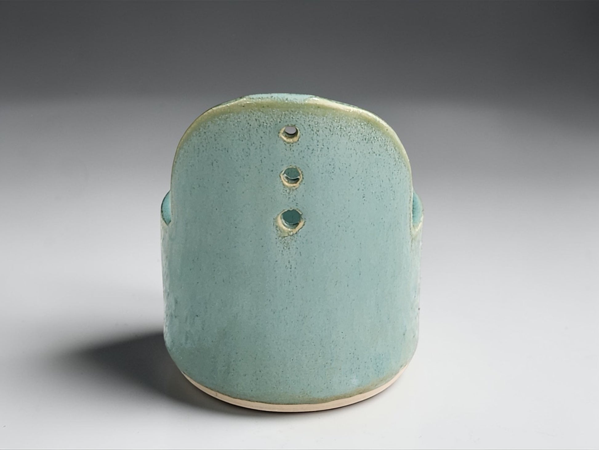Australian handmade pottery herb stripper with soft green glaze