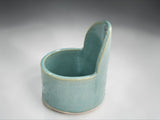 Spearmint green handmade pottery herb stripper with glossy glaze